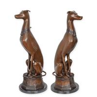 A BRONZE PAIR OF SITTING WHIPPETS