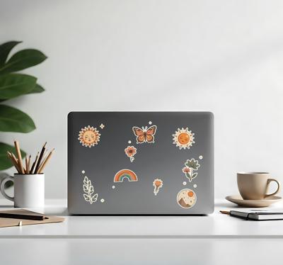 Bloemen- en zonstickerset laptop sticker