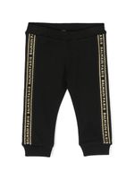 Balmain Kids pantalon de jogging à bande logo - Noir