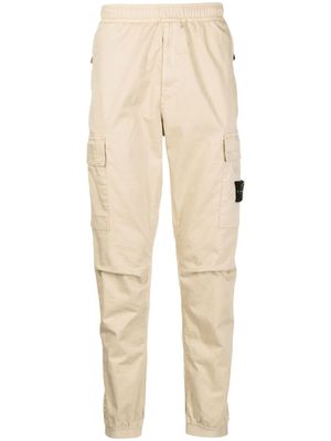 Stone Island pantalon fuselé à poches cargo - Jaune