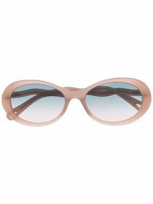 Chloé Eyewear lunettes de soleil CH0088S à monture ovale - Tons neutres