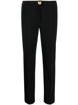 Moschino pantalon fuselé à bandes contrastantes - Noir