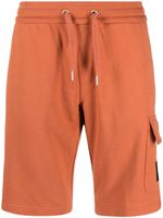 Calvin Klein Jeans pantalon de jogging à patch logo - Orange