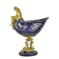 A BRONZE MOUNTED PORCELAIN NAUTILUS SHELL A BRONZE MOUNTED PORCELAIN NAUTILUS SHELL