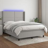 Boxspring met matras en LED stof lichtgrijs 140x190 cm
