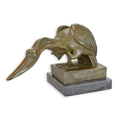 A BRONZE SCULPTURE OF A PELICAN