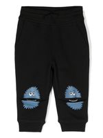 Stella McCartney Kids pantalon de jogging à imprimé monstre - Noir - thumbnail