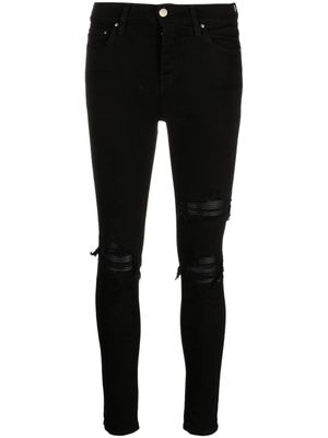 AMIRI jean skinny à effet usé - Noir