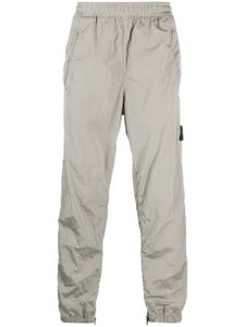 Stone Island pantalon de jogging à motif Compass - Gris