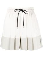 sacai minijupe-short à design plissé - Blanc