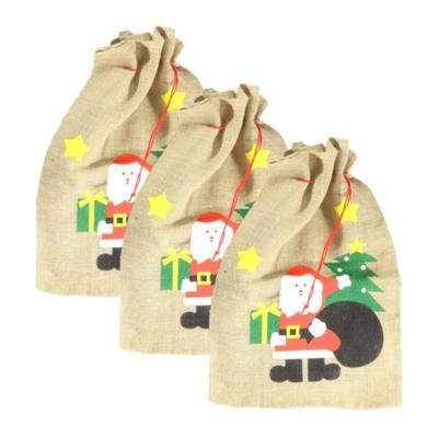 Kerst cadeauzak - 3x stuks - kerstman print - 60 x 90 cm - jute - met trekkoord - kerstcadeaus zak