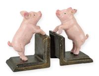 A PAIR OF CAST IRON PIG BOOKENDS