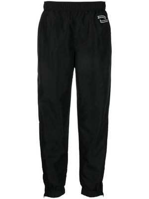 Opening Ceremony pantalon de jogging à patch logo - Noir