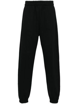 GCDS pantalon de jogging à logo brodé - Noir