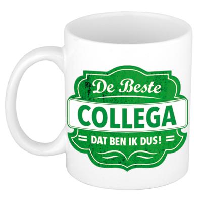 De beste collega dat ben ik dus - cadeau koffiemok - beker - wit met groen embleem - 300 ml De beste collega dat ben ik dus - cadeau koffiemok - beker - wit met groen embleem - 300 ml