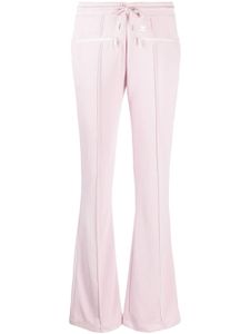 Courrèges pantalon évasé à patch logo - Rose