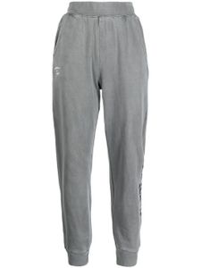 AAPE BY *A BATHING APE® pantalon de jogging à logo imprimé - Gris