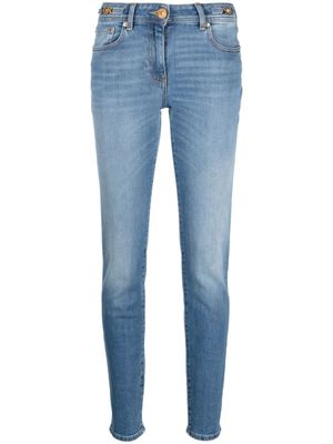 Versace jean skinny à taille basse - Bleu