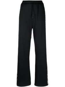 DSQUARED2 pantalon de jogging ample à bandes logo - Noir