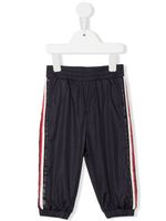 Moncler Enfant pantalon de jogging à détails rayés - Bleu