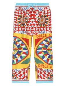 Dolce & Gabbana Kids pantalon en soie à imprimé Carretto - Rouge