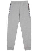 Burberry pantalon de jogging à empiècements à carreaux - Gris