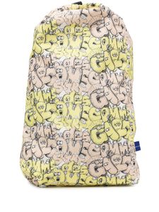 Comme Des Garçons Shirt x Kaws sac à dos à logo imprimé - Jaune