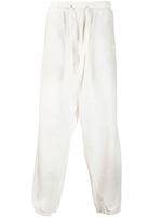 GUESS USA pantalon de jogging en coton à logo imprimé - Blanc