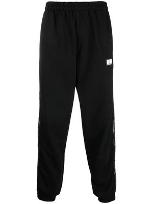 VTMNTS pantalon de jogging à logo imprimé - Noir