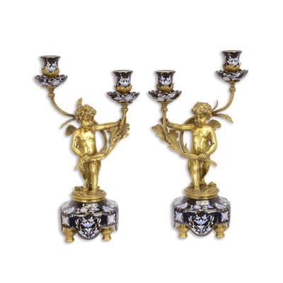 A PAIR OF BRONZE MOUNTED TWO BRANCH PORCELAIN CANDELABRA