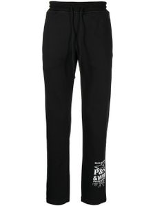 White Mountaineering pantalon de jogging à logo imprimé - Noir