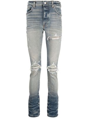 AMIRI jean slim à effet usé - Bleu