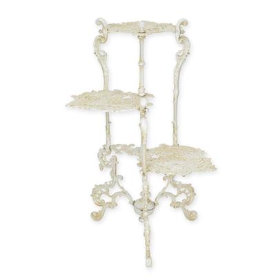 A CAST IRON 3 TIER FLOWER TABLE, WHITE