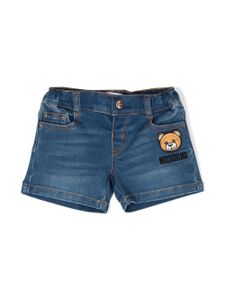 Moschino Kids jupe en jean à logo appliqué - Bleu