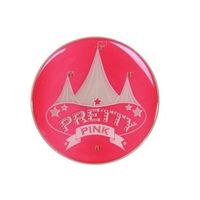 Roze broche met licht en circus afbeelding