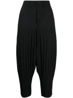 Homme Plissé Issey Miyake plissé cropped drop-crotch trousers - Noir