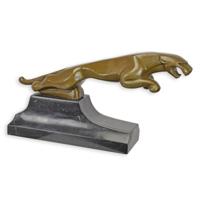 A BRONZE SCULPTURE OF A JAGUAR