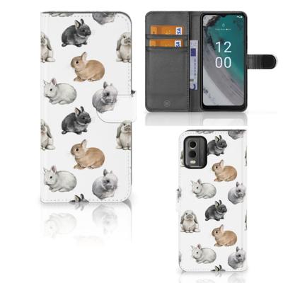 Telefoonhoesje | Met pasjeshouder | voor Nokia C32 Konijntjes