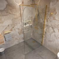 Sanivo Inloopdouche Ronde Hoek Glas 8mm Nano Coating Geborsteld Goud Profiel met Stang (Alle Maten)