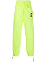 Off-White pantalon de jogging à logo imprimé - Jaune Off-White pantalon de jogging à logo imprimé - Jaune