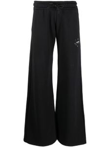 Off-White pantalon de jogging en coton à logo imprimé - Noir