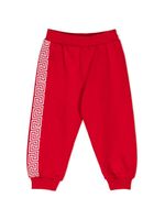 Versace Kids pantalon de jogging en coton à motif Greca - Rouge