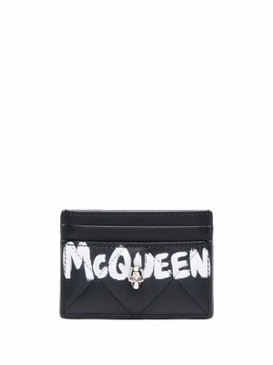 Alexander McQueen portefeuille matelassé à tête de mort - Noir