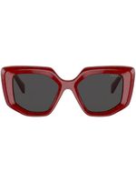 Prada Eyewear lunettes de soleil à monture géométrique - Rouge