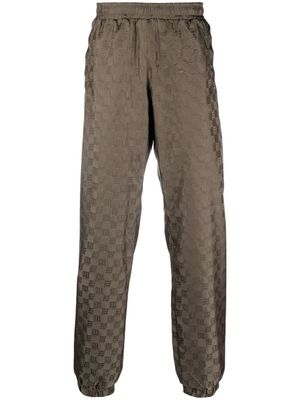 MISBHV pantalon de jogging à motif monogrammé - Vert