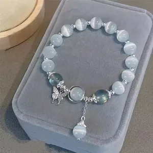 Elastische Armband met Maansteen en Vlinder Bedel - Sieraden - Spiritueelboek.nl