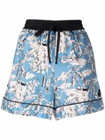 Moncler short en soie fleurie à lien de resserrage - Bleu