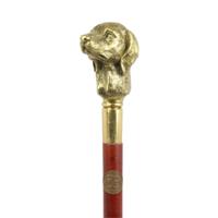 A BRONZE-HANDLED WALKING STICK