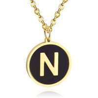 Goudkleurige Dames Schakelketting met Zwarte Kettinghanger Letter N