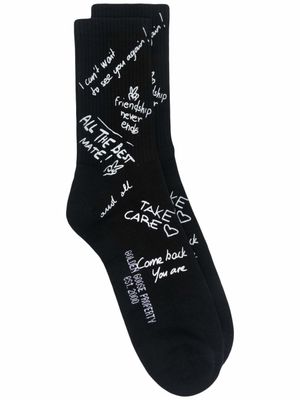Golden Goose chaussettes nervurées à slogan imprimé - Noir